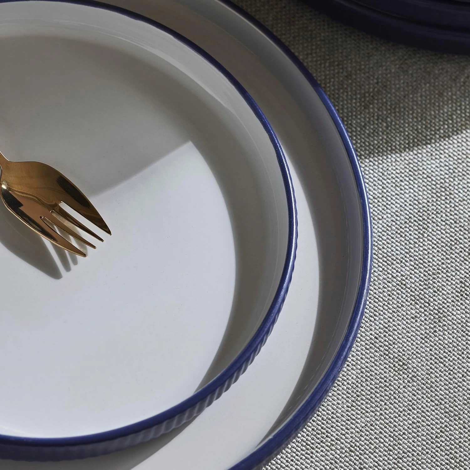Christian Siriano Laro 12-Piece Stoneware Dinnerware Set, Plates and Bowls Set, Microwave and Dishwasher Safe, Dish Set for 4, Dark Blue
