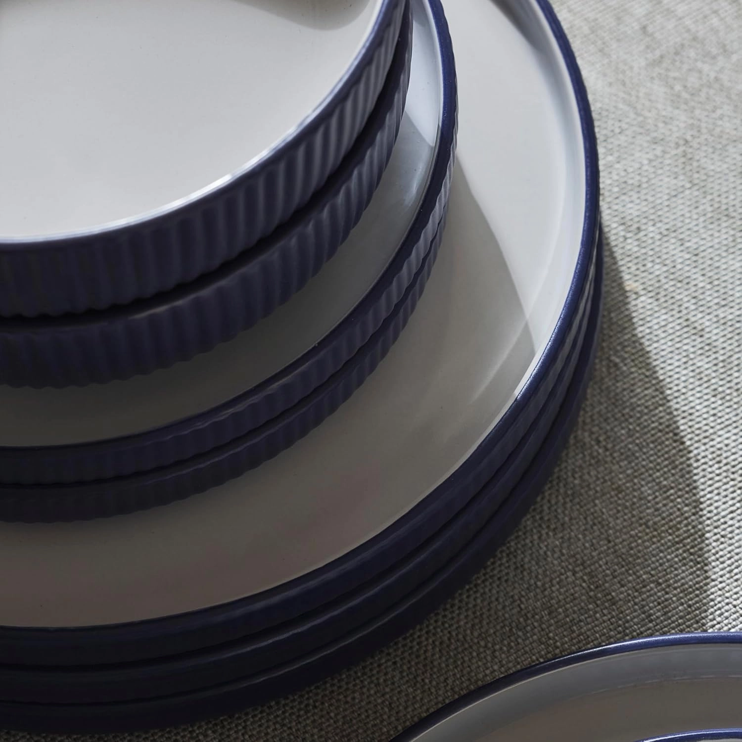 Christian Siriano Laro 12-Piece Stoneware Dinnerware Set, Plates and Bowls Set, Microwave and Dishwasher Safe, Dish Set for 4, Dark Blue