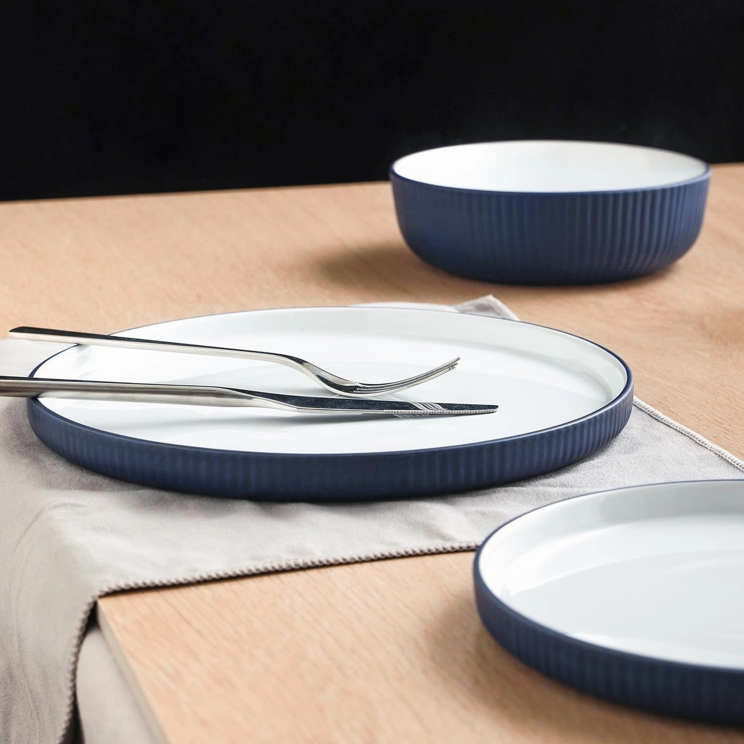 Christian Siriano Laro 12-Piece Stoneware Dinnerware Set, Plates and Bowls Set, Microwave and Dishwasher Safe, Dish Set for 4, Dark Blue