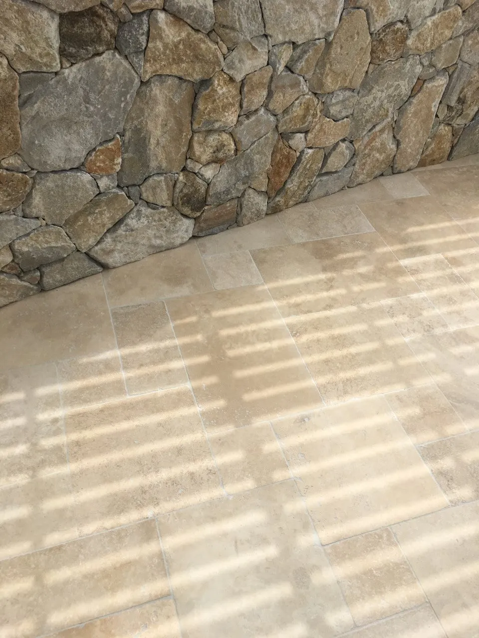 CLASSIC TRAVERTINE TUMBLED & UNFILLED 610X610X30MM PAVER