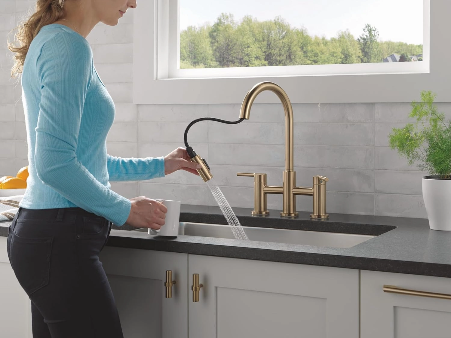 Delta 39876LF Nicoli 1.8 GPM Single Hole Pull Down Bridge Kitchen Faucet - Champagne Bronze